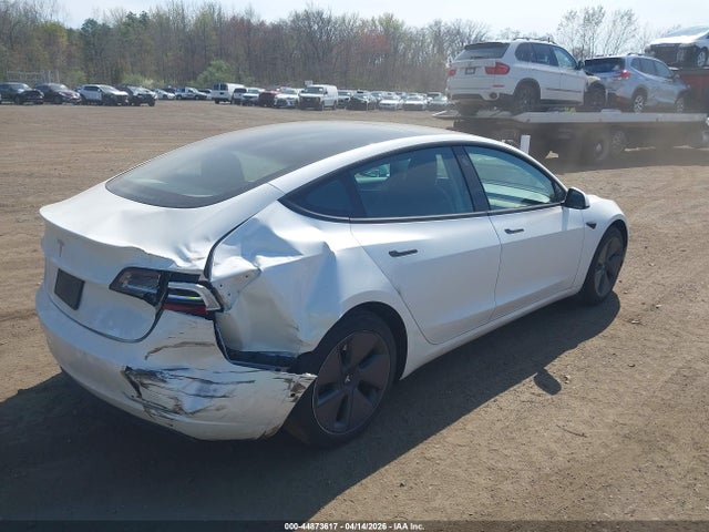 2021 Tesla Model 3 Standard Range Plus Rear-wheel Drive მანქანა იყიდება აუქციონზე, vin: 5YJ3E1EA3MF048024, აუქციონის ნომერი: 44873617