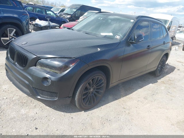 2014 BMW X1 WBAVL1C58EVY19386 Photo 1