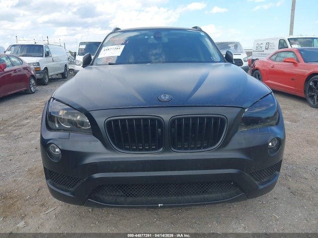 2014 BMW X1 WBAVL1C58EVY19386 Photo 5