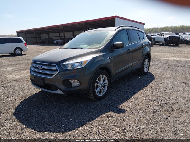 2018 FORD ESCAPE 1FMCU9GD4JUD31779 Photo 1