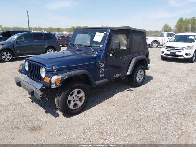2002 JEEP WRANGLER 1J4FA39S02P719783 Photo 1