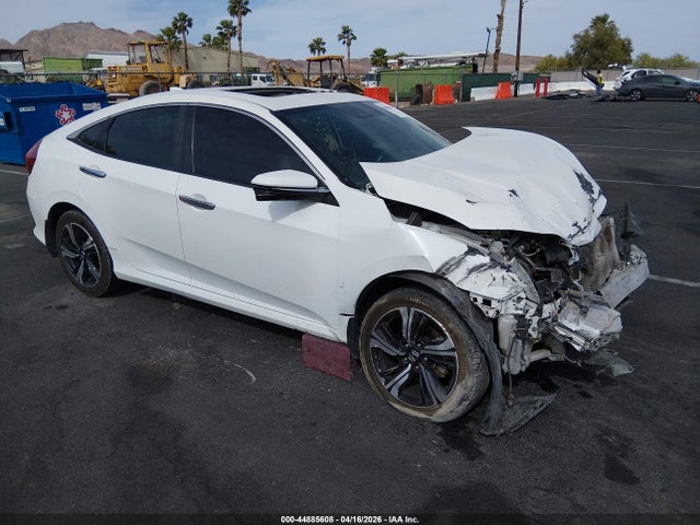 Auction sale of the 2016 Honda Civic Touring, vin: 19XFC1F97GE209928, lot number: 44885608