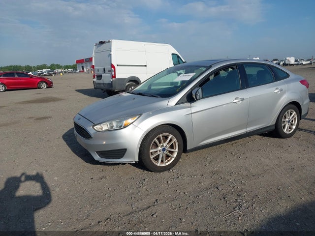 2016 FORD FOCUS 1FADP3F23GL284827 Photo 1