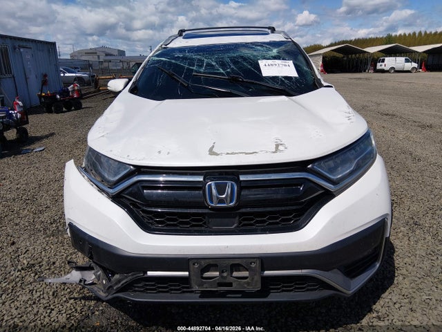 2021 Honda Cr-v Hybrid Touring მანქანა იყიდება აუქციონზე, vin: 7FART6H94ME008263, აუქციონის ნომერი: 44892704