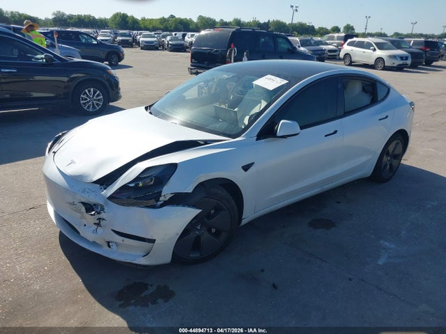 2021 Tesla Model 3 Standard Range Plus Rear-wheel Drive მანქანა იყიდება აუქციონზე, vin: 5YJ3E1EAXMF915922, აუქციონის ნომერი: 44894713