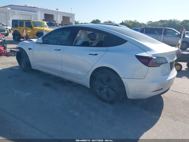 2021 Tesla Model 3 Standard Range Plus Rear-wheel Drive მანქანა იყიდება აუქციონზე, vin: 5YJ3E1EAXMF915922, აუქციონის ნომერი: 44894713