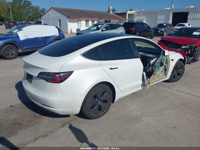 2021 Tesla Model 3 Standard Range Plus Rear-wheel Drive მანქანა იყიდება აუქციონზე, vin: 5YJ3E1EAXMF915922, აუქციონის ნომერი: 44894713