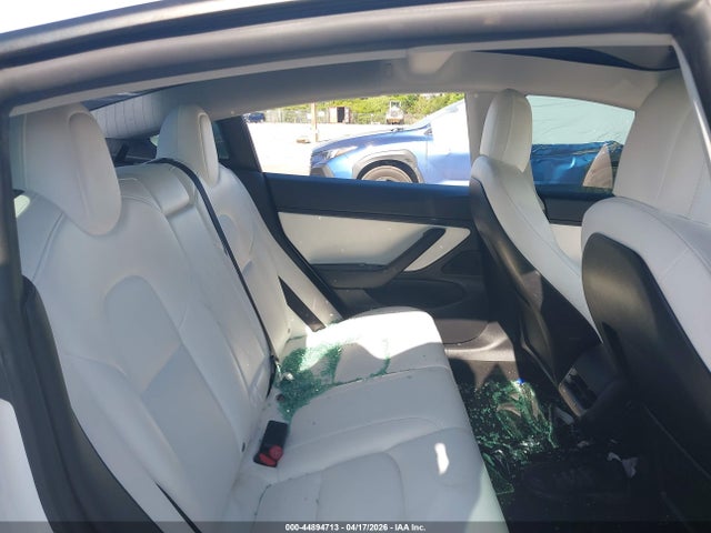 2021 Tesla Model 3 Standard Range Plus Rear-wheel Drive მანქანა იყიდება აუქციონზე, vin: 5YJ3E1EAXMF915922, აუქციონის ნომერი: 44894713