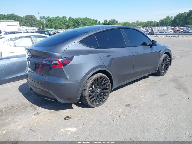 Продаж на аукціоні авто 2021 Tesla Model Y Standard Range Rear-wheel Drive, vin: 5YJYGDED4MF106198, номер лоту: 44896227