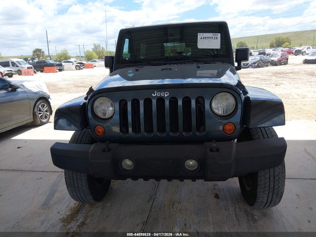 2007 Jeep Wrangler Unlimited Sahara მანქანა იყიდება აუქციონზე, vin: 1J4GA591X7L215411, აუქციონის ნომერი: 44899528