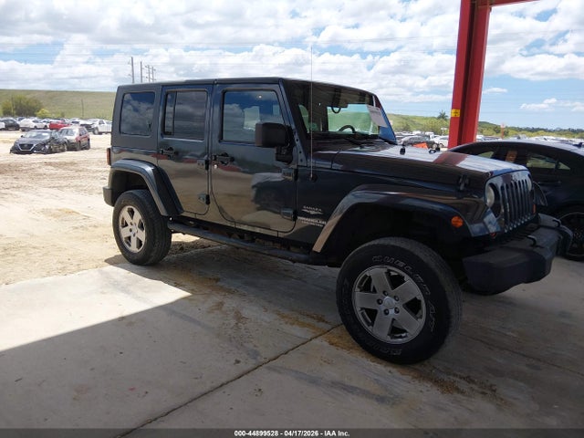 2007 Jeep Wrangler Unlimited Sahara მანქანა იყიდება აუქციონზე, vin: 1J4GA591X7L215411, აუქციონის ნომერი: 44899528