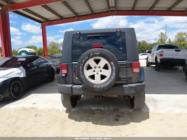 2007 Jeep Wrangler Unlimited Sahara მანქანა იყიდება აუქციონზე, vin: 1J4GA591X7L215411, აუქციონის ნომერი: 44899528