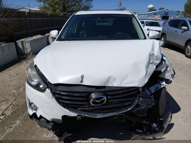 2016 Mazda Cx-5 Grand Touring მანქანა იყიდება აუქციონზე, vin: JM3KE4DY5G0791130, აუქციონის ნომერი: 44902019