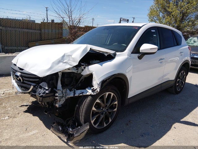 2016 Mazda Cx-5 Grand Touring მანქანა იყიდება აუქციონზე, vin: JM3KE4DY5G0791130, აუქციონის ნომერი: 44902019