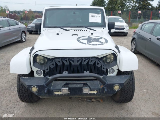 1C4BJWDGXEL218081 Jeep Wrangler Unlimited Freedom Edition