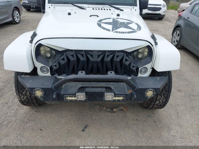 1C4BJWDGXEL218081 Jeep Wrangler Unlimited Freedom Edition