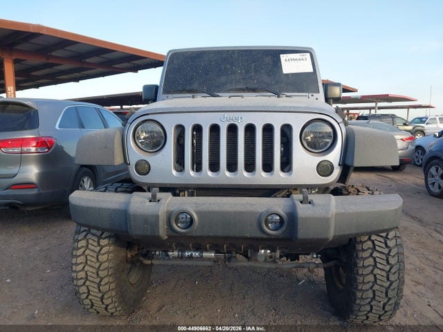 1C4HJWDG2GL177412 Jeep Wrangler Unlimited Sport