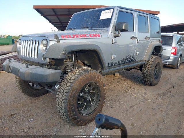 1C4HJWDG2GL177412 Jeep Wrangler Unlimited Sport