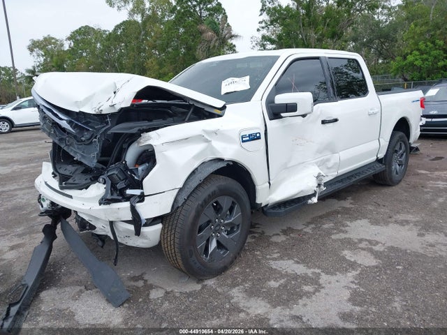 2025 Ford F-150 Lightning Lariat მანქანა იყიდება აუქციონზე, vin: 1FT6W5L78SWG28208, აუქციონის ნომერი: 44910654