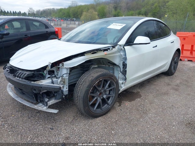 Tesla Model 3 Standard Range Plus Rear-wheel Drive 2021 5YJ3E1EAXMF989616 Image 2