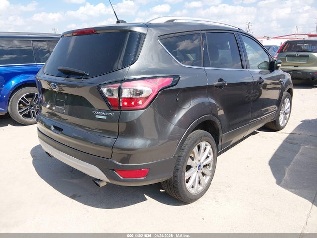 2017 Ford Escape Titanium მანქანა იყიდება აუქციონზე, vin: 1FMCU0JD9HUB79772, აუქციონის ნომერი: 44921636