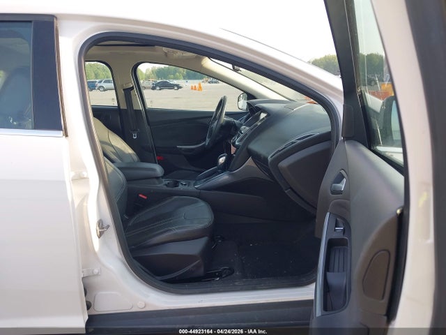 Продажа на аукционе авто 2014 Ford Focus Titanium, vin: 1FADP3N2XEL167583, номер лота: 44923164