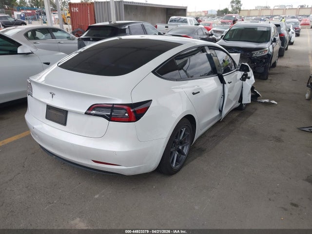 2021 Tesla Model 3 Standard Range Plus Rear-wheel Drive მანქანა იყიდება აუქციონზე, vin: 5YJ3E1EA4MF000824, აუქციონის ნომერი: 44923379