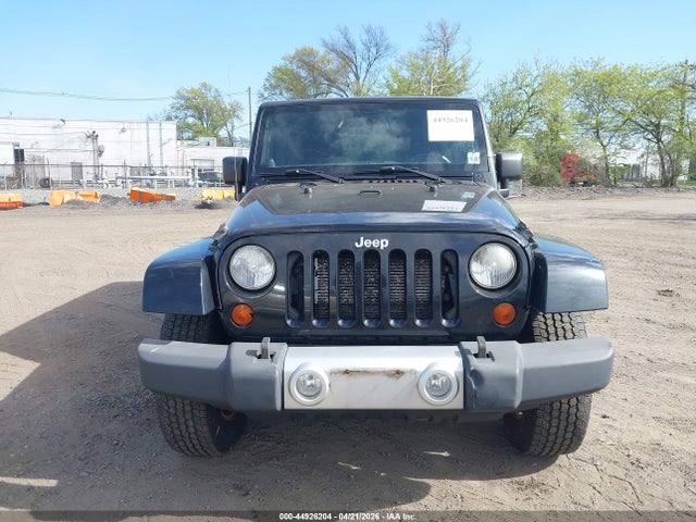 44926204 :رقم المزاد ، 1C4BJWEG8CL100879 vin ، 2012 Jeep Wrangler Unlimited Sahara مزاد بيع