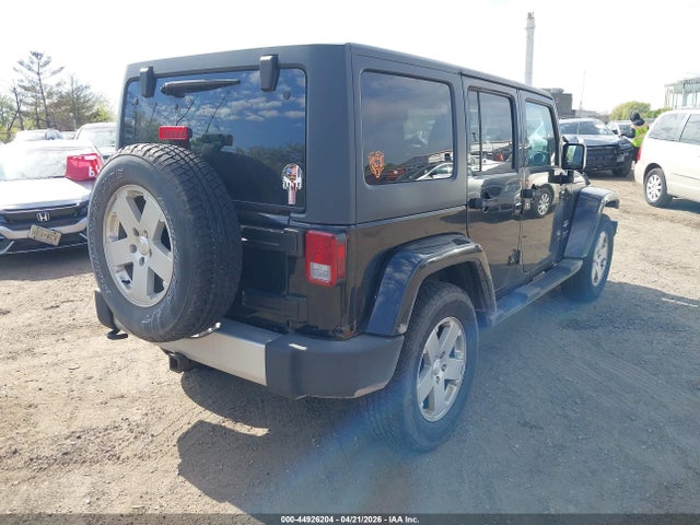 44926204 :رقم المزاد ، 1C4BJWEG8CL100879 vin ، 2012 Jeep Wrangler Unlimited Sahara مزاد بيع