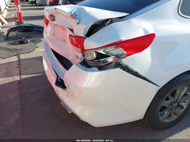 5XXGT4L12GG032877 KIA Optima Lx Turbo