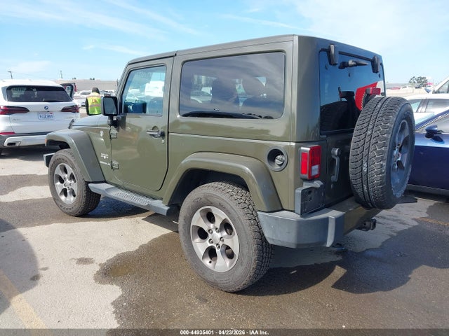 1C4GJWBG3GL113037 Jeep Wrangler Sahara