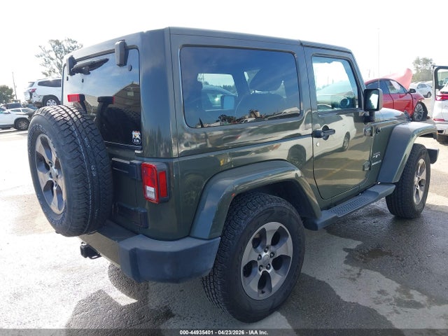 1C4GJWBG3GL113037 Jeep Wrangler Sahara