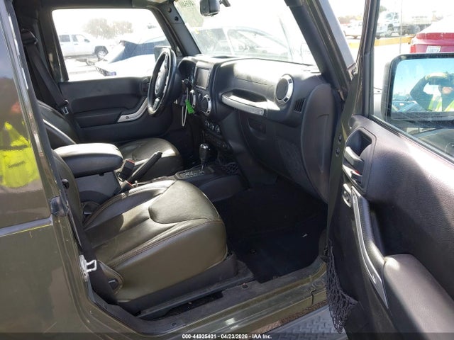 1C4GJWBG3GL113037 Jeep Wrangler Sahara