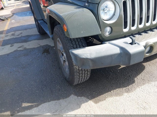 1C4GJWBG3GL113037 Jeep Wrangler Sahara