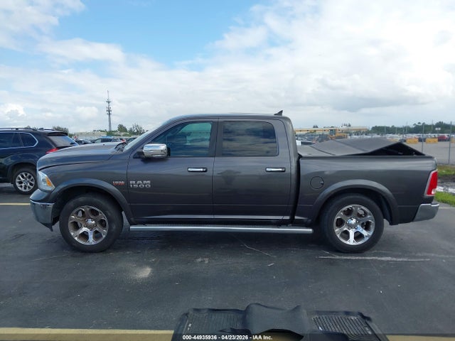 2015 Ram 1500 Laramie მანქანა იყიდება აუქციონზე, vin: 1C6RR6NT9FS770494, აუქციონის ნომერი: 44935936