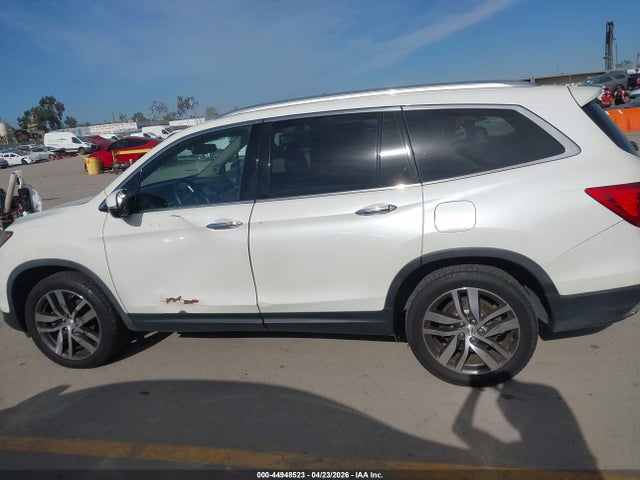 5FNYF6H03HB032396 Honda Pilot Elite