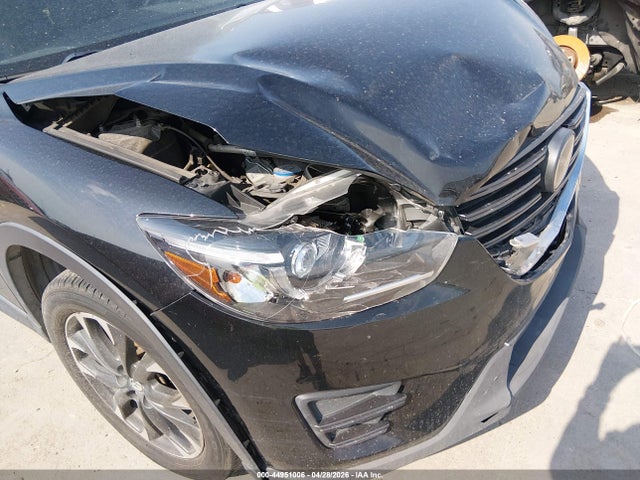 2016 Mazda Cx-5 Grand Touring მანქანა იყიდება აუქციონზე, vin: JM3KE2DY5G0696894, აუქციონის ნომერი: 44951006