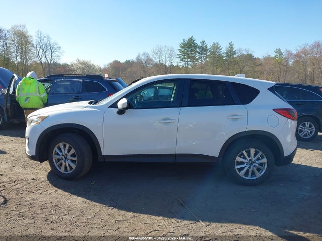 2014 Mazda Cx-5 Touring მანქანა იყიდება აუქციონზე, vin: JM3KE4CYXE0394981, აუქციონის ნომერი: 44955105
