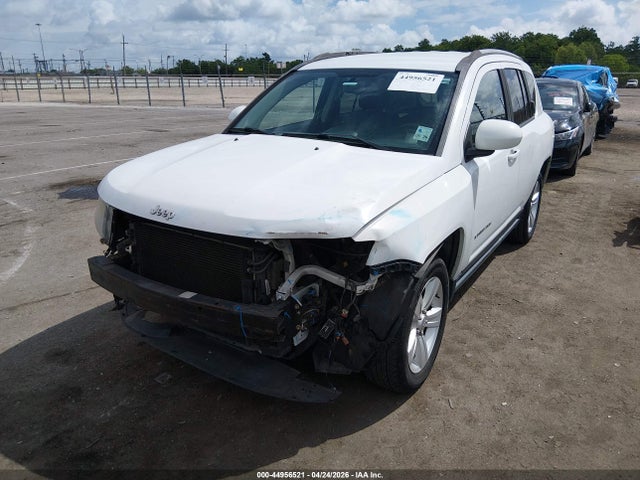 1C4NJCEA9GD599537 Jeep Compass Latitude