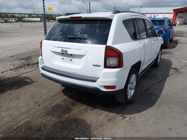 1C4NJCEA9GD599537 Jeep Compass Latitude