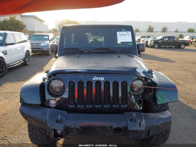 1C4BJWEG1EL108356 Jeep Wrangler Unlimited Sahara