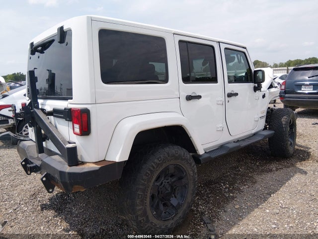 2014 Jeep Wrangler Unlimited Sahara მანქანა იყიდება აუქციონზე, vin: 1C4BJWEG1EL219506, აუქციონის ნომერი: 44963045