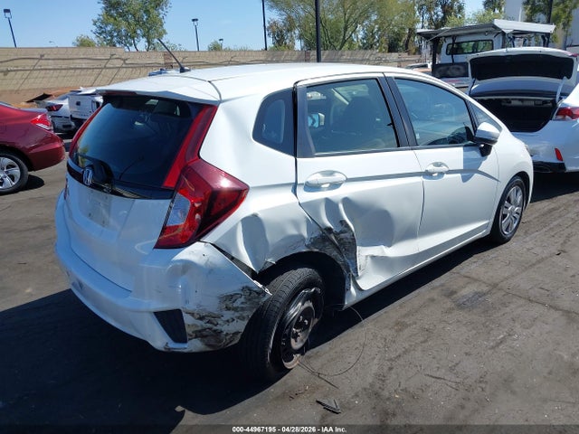 JHMGK5H50GX018374 Honda FIT LX