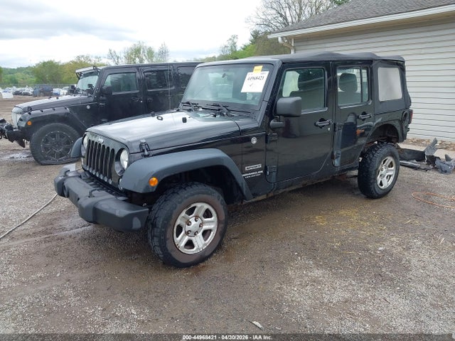 44968421 :رقم المزاد ، 1C4BJWDG3EL104228 vin ، 2014 Jeep Wrangler Unlimited Sport مزاد بيع