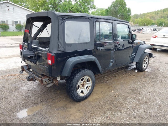 44968421 :رقم المزاد ، 1C4BJWDG3EL104228 vin ، 2014 Jeep Wrangler Unlimited Sport مزاد بيع