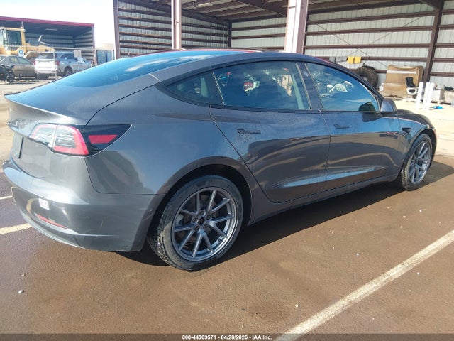 Tesla Model 3 Standard Range Plus Rear-wheel Drive 2021 5YJ3E1EAXMF982066 Image 4