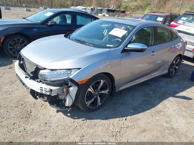 2016 Honda Civic Touring მანქანა იყიდება აუქციონზე, vin: 19XFC1F93GE205391, აუქციონის ნომერი: 44974352