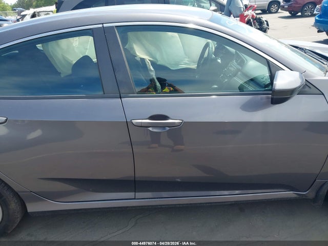 Auction sale of the 2016 Honda Civic Lx, vin: 19XFC2F54GE002934, lot number: 44976074
