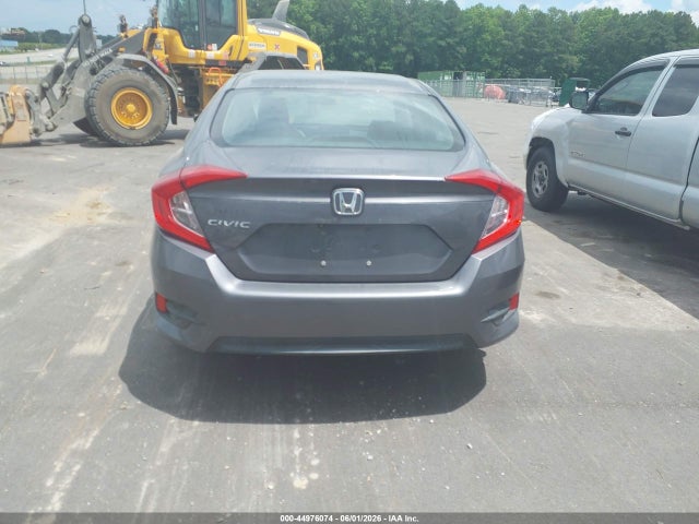 Auction sale of the 2016 Honda Civic Lx, vin: 19XFC2F54GE002934, lot number: 44976074