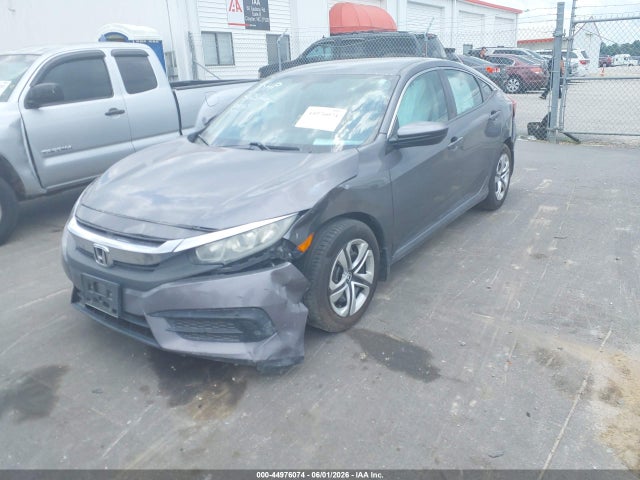 Auction sale of the 2016 Honda Civic Lx, vin: 19XFC2F54GE002934, lot number: 44976074